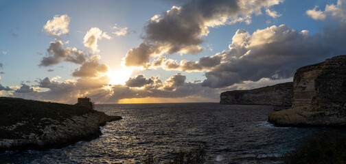 Sunsetting over Xlendi Bay in Gozo.