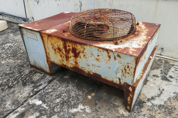 Old air compressor located on the deck.Rust of metals.Corrosive Rust on old iron.Use as...