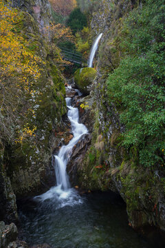Waterfall in Manteigas Town, Serra da Estrela or Mountain of Star in Portugal called Poco do Inferno or Hell Pit