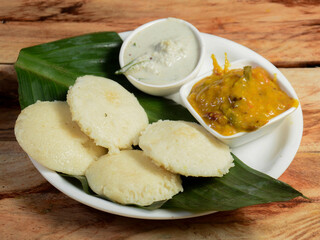 Idli or idly is a healthy Indian, vegetarian, traditional and popular steam cooked rice cakes...