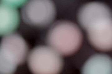 Blurred multicolored lights on a dark background.