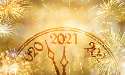 New Year clock near to the midnight of 2020, fireworks golden bokeh