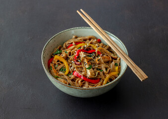 Noodles with pork, pepper and soy sauce. Asian food. Wok.