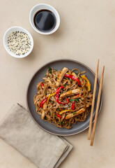 Noodles with pork, pepper and soy sauce. Asian food. Wok.