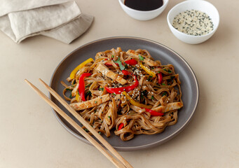 Noodles with pork, pepper and soy sauce. Asian food. Wok.