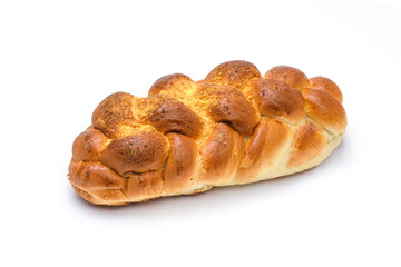 Close-up of a traditional sweet braided yeast bread called - zopf, challah, petticoat or brioche isolated on a white background (high details)