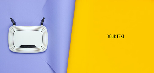 Wi-fi router on wrapped paper background with space for your text. Pastel color trend, minimalistic...