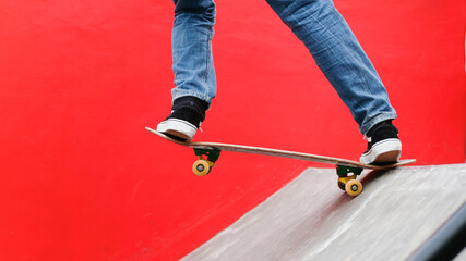 Fototapeta na wymiar skateboarder in action on a skateboard