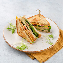 Group of club sandwiches with chicken on white bread