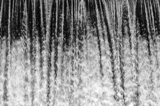 Beautiful texture of white bubbling water. Waterfall © Tatiana Kuklina
