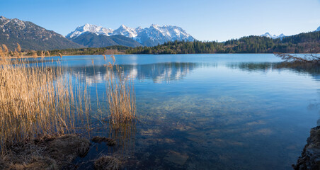 Fototapeta na wymiar beautiful lake Barmsee, Karwendel mountains view. idyllic landscape early springtime.