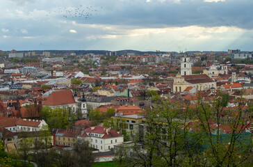Fototapeta na wymiar April 27, 2018 Vilnius, Lithuania. View of the old city of Vilnius from Three Cross Mountain.