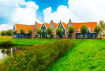 Fototapeta na wymiar Volendam is a town in North Holland in the Netherlands. Colored houses of marine park in Volendam. Netherlands.