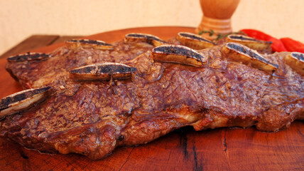 Assado de tira. Brazilian special cut of the ox rib