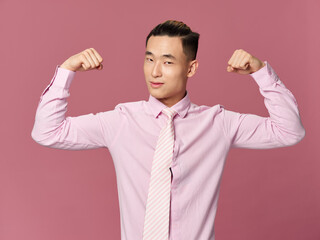 Handsome man of asian appearance shirt tie studio gesturing with hands