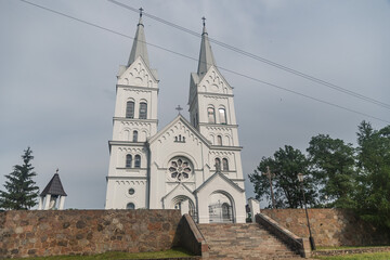 Fototapeta na wymiar Tserkov Bozhyego Provideniya. Catholic cathedral in Slabodka, Belarus. Romanesque Revival architecture