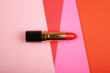 Red lipstick on colorful background