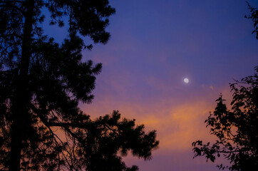 Fototapeta na wymiar moonset while sun rising