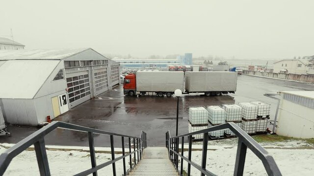 Truck drives through logistics center