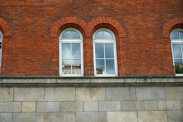 Fototapeta na wymiar brick wall with windows