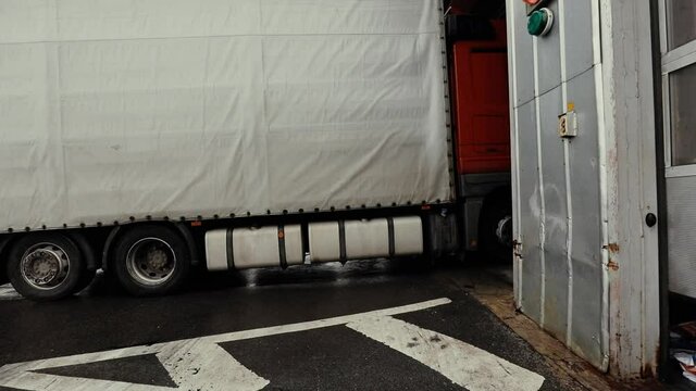 Truck drives through logistics center