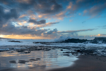Obraz premium Landscape. El puertillo beach with strong waves at sunset. Arucas. Las Palmas. Canary islands