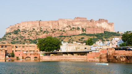 Fototapeta na wymiar Mehrangarh Fort from Gulab Sagar, Jodhpur, India