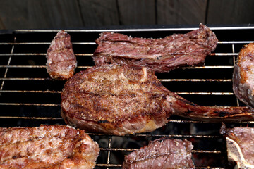 Grilled steaks on the grill