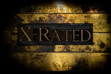 X-Rated image of text on copper and gold background