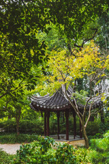 Traditional Chinese pavilion among trees on Tiger Hill (Huqiu), Suzhou, Jiangsu, China