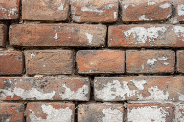 Fragment of the facade of an old brick house