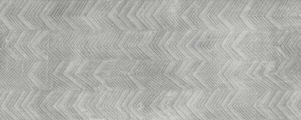 Background with zigzag pattern on light cement floor