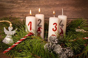 Advent wreath with three burning candles