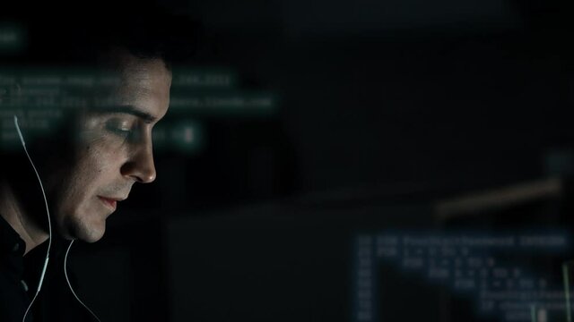 Programer hands working on innovative sophisticated technology with augmented reality hologram on laptop