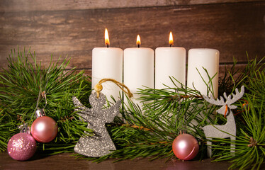 Advent wreath for christmas, three lit candle