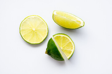 Obraz na płótnie Canvas green fresh lemon and lime Set cut slices, white background