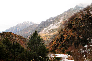 snow covered mountains on the way to the frozen waterfall of Gveleti