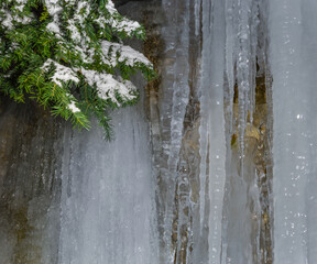 closeup frozen waterfall  in the mountain canyon