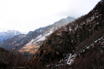 snow covered mountains on the way to the frozen waterfall of Gveleti