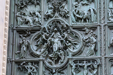 The doors of the Milan Cathedral. Fragment. Duomo Cathedral. Italy.