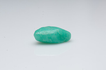 Natural chrysoprase stone on white background