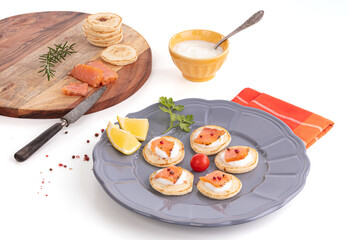 Toast of smoked salmon in a plate with fresh cream