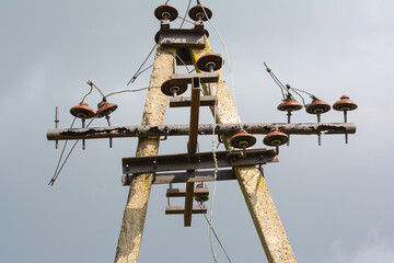 Concrete table with electric insulators