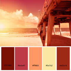 Sunset Designer Pack Color Palette inspired by nature. Long jetty pier on wide open sandy beach overlooking ocean. Sunset. Designer pack with photograph and swatches with hex codes references. - obrazy, fototapety, plakaty