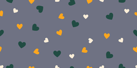 Multicolored hearts on dark grey background seamless pattern 