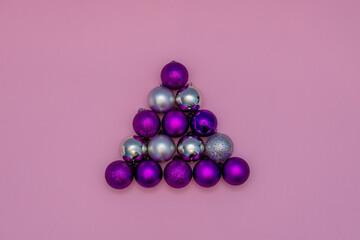 Christmas baubles as Christmas tree. Minimal Christmas concept