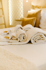 Fototapeta na wymiar Towels in Hotel Room or guest house, Welcome guests, Room service