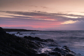 Fototapeta na wymiar Orange and Pinks skies over Shell Bay.