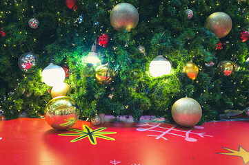 Decorated Christmas tree and New Year holidays  sparking, glowing. Happy New Year theme Blurred bokeh background