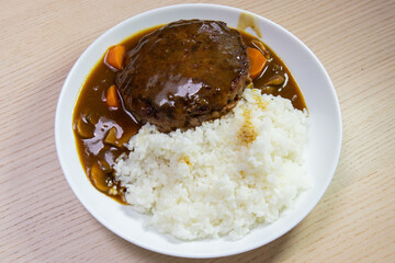 A plate of Japanese hamburg curry rice.